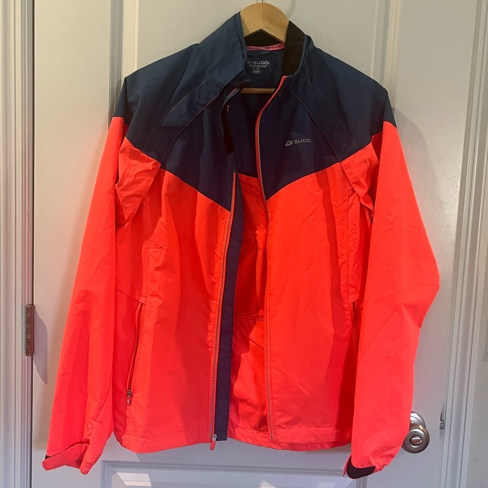 SUGOI Navy and Neon Pink Cycling Jacket-versa full zip 2/1 magnetic